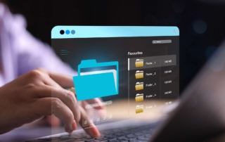 DLP Policy Implementation. Hands typing on a laptop, with a translucent blue window projected above it displaying digital folders and file names. The image symbolizes file management, cloud storage, or secure document access.