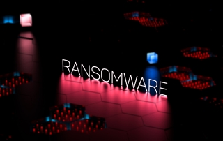 Rhysida Ransomware concept photo 3D rendered. The word RANSOMWARE is written in all capital, white letters and stands in the middle of the screen. It's reflection on the floor is red and there is a red and blue cube floating in the background. There seems to be panels of red and blue tech boards scattered around the image.