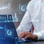 Cyber breach recovery timeline. The image shows a person working on a laptop with a digital overlay of data visualizations and charts. The person, dressed in a white shirt, is using the keyboard, and their focus appears to be on the screen. Overlaid on the image are various data elements, including bar graphs, line charts, percentage indicators, and circular progress graphics, all representing analytics or data monitoring. The background is slightly blurred, emphasizing the digital data elements, which give the scene a futuristic, high-tech feel, as if the individual is analyzing real-time information or working in data science, cybersecurity, or business analytics.