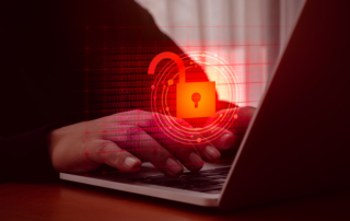 Cyber breach legal support. This image shows a person typing on a laptop keyboard, with a digital overlay of a glowing red lock icon surrounded by circular patterns and binary code. The red lock symbol indicates a cybersecurity or data protection theme. The background is blurred, and the red color scheme suggests themes of hacking, security breaches, or online protection. The person's hands are clearly visible, focused on interacting with the laptop, creating a visual representation of digital security concerns.