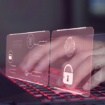 Data exfiltration response. This image depicts hands typing on a laptop with a backlit keyboard, glowing red. Overlaid on the scene are translucent, futuristic digital panels that appear to float above the keyboard. These panels display icons and information related to cybersecurity and data protection. Prominent features include a fingerprint icon, a lock symbol, and a folder icon, indicating biometric security and data privacy. The panels also have small text and graphics resembling user interface elements, adding a high-tech and futuristic feel to the scene. The overall tone suggests themes of secure access, technology, and innovation.