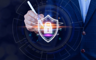 Insider threats and ransomware risks. A person in a suit holds a stylus or pen pointing toward a glowing digital shield with a lock icon at its center. The background has a high-tech, circular interface design, emphasizing the theme of cybersecurity and data encryption.