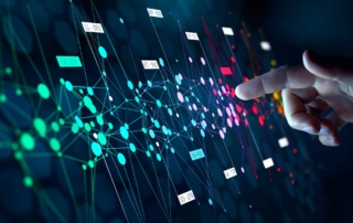 Cloud-Based Email Threat Prevention. The image displays a hand pointing to a complex digital network interface, possibly representing data analysis or cybersecurity infrastructure.