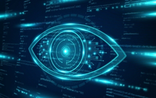 Cyber threat hunting ransomware benefits. A glowing digital eye graphic overlays a dark screen filled with code, symbolizing cybersecurity, surveillance, or AI vision systems.