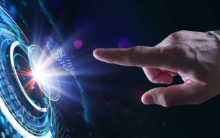 Encrypted Data Recovery Services. A suited hand reaches toward a glowing circular interface made of layered, rotating digital rings. The visual resembles high-tech touchscreens and suggests interaction with a secure digital system or dashboard.