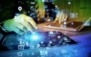 Disaster Recovery for Enterprises. Hands typing on a tablet or laptop while surrounded by floating digital icons like locks, charts, and mail envelopes, symbolizing data, networks, and cybersecurity.