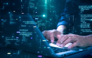 Ransomware impact on customer trust. lose-up of hands on a laptop keyboard with glowing code and digital particles floating around, giving a high-tech, programming or hacking impression.