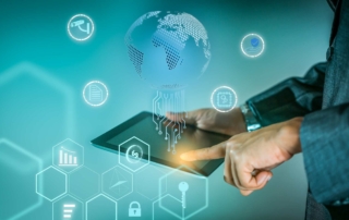 OT Security Best Practices. A businessperson’s hand touches a tablet emitting glowing icons like a globe, document, padlock, and various analytics symbols. The background is a gradient blue-green, evoking an advanced technology or cyber defense theme.